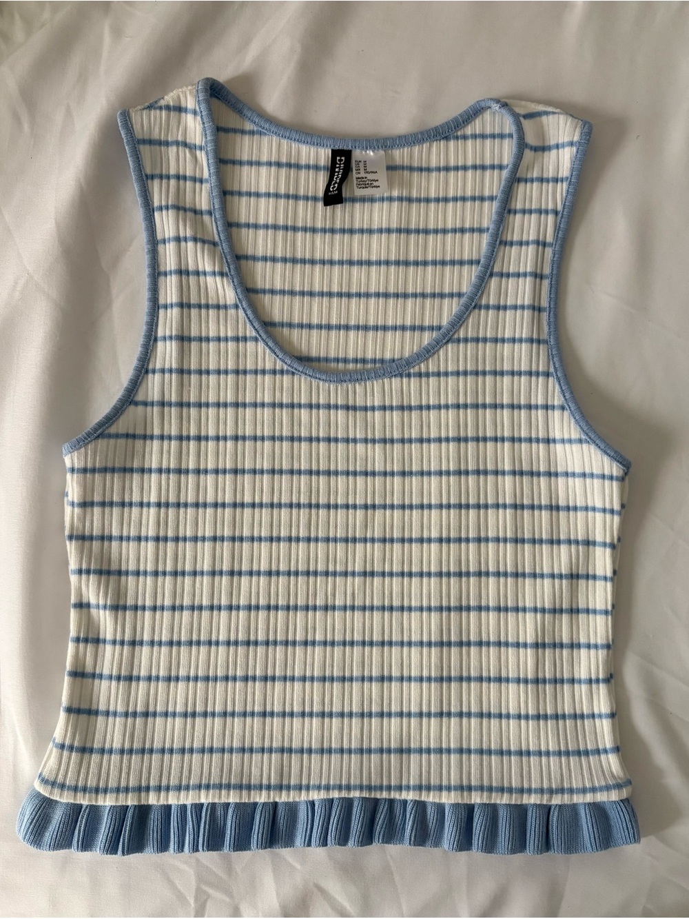 Divided Ribbed White and Light Blue Striped Tank with Ruffle Hem